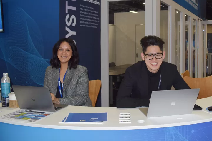 CESMII staff at a conference booth