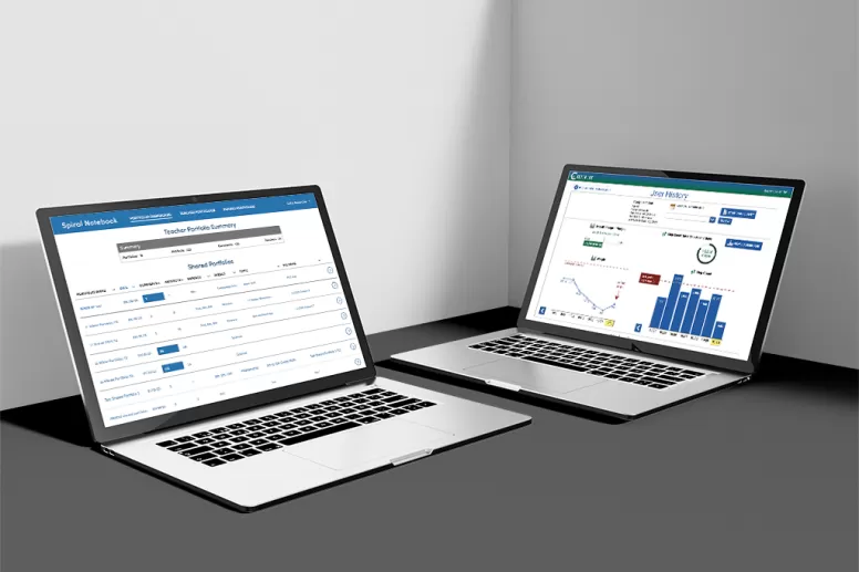 Two laptops with examples of OARC-developed data dashboards on the screens